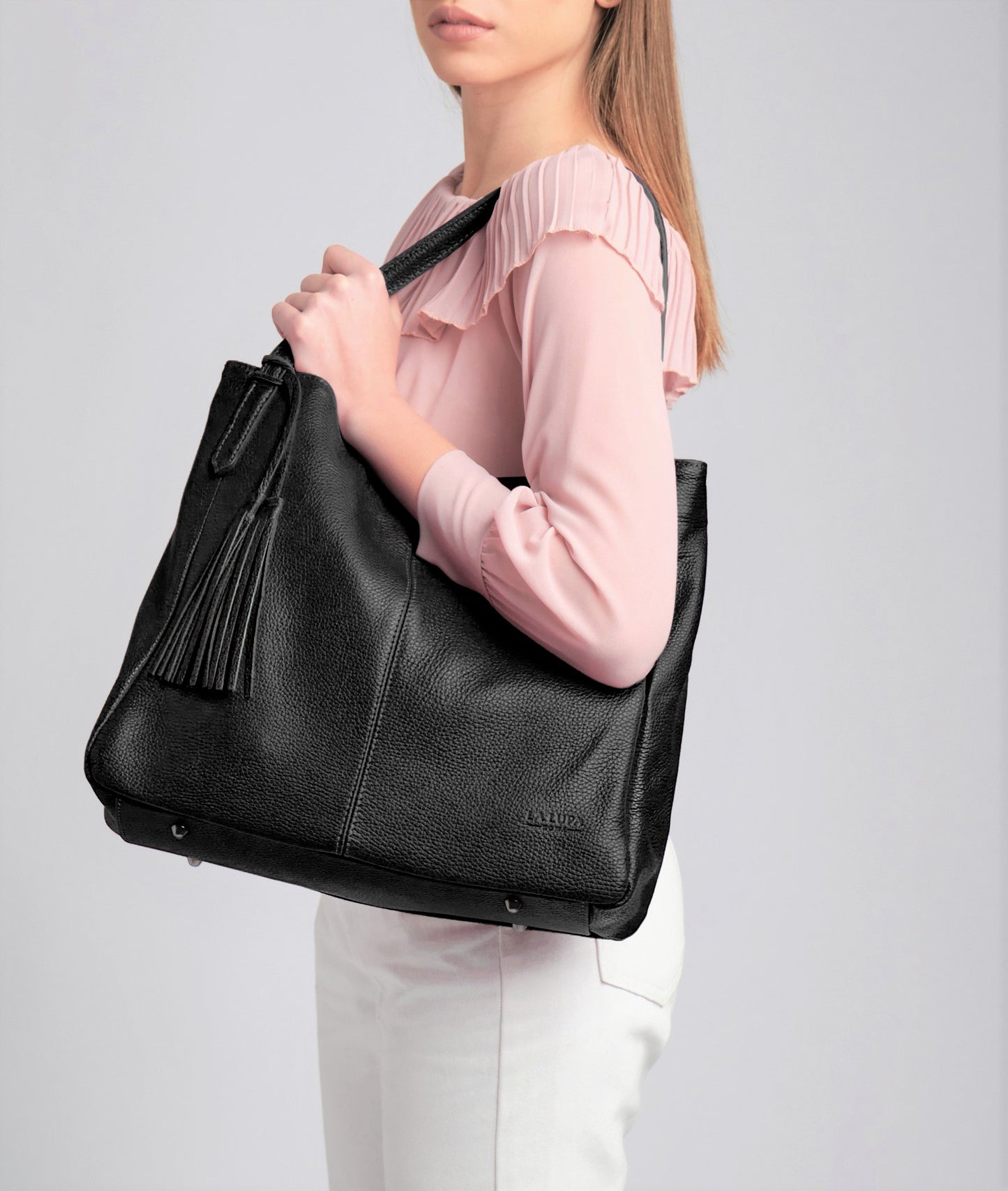 Lucia Black Tote Italian Leather Handbag from LA LUPA / Model wears bag on shoulder