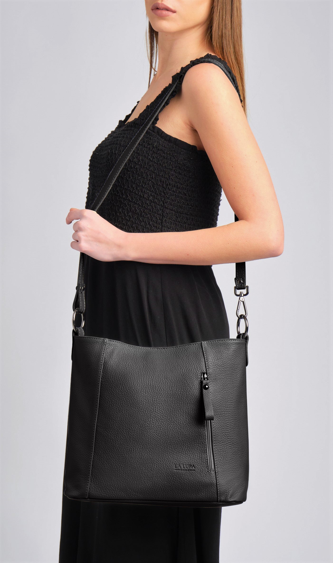 Valentina Crossbody Black Italian Leather Handbag from LA LUPA / Model wears bag on shoulder