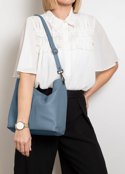 Lola Dusky Blue Crossbody Italian Leather handbag from LA LUPA / Model wears on shoulder