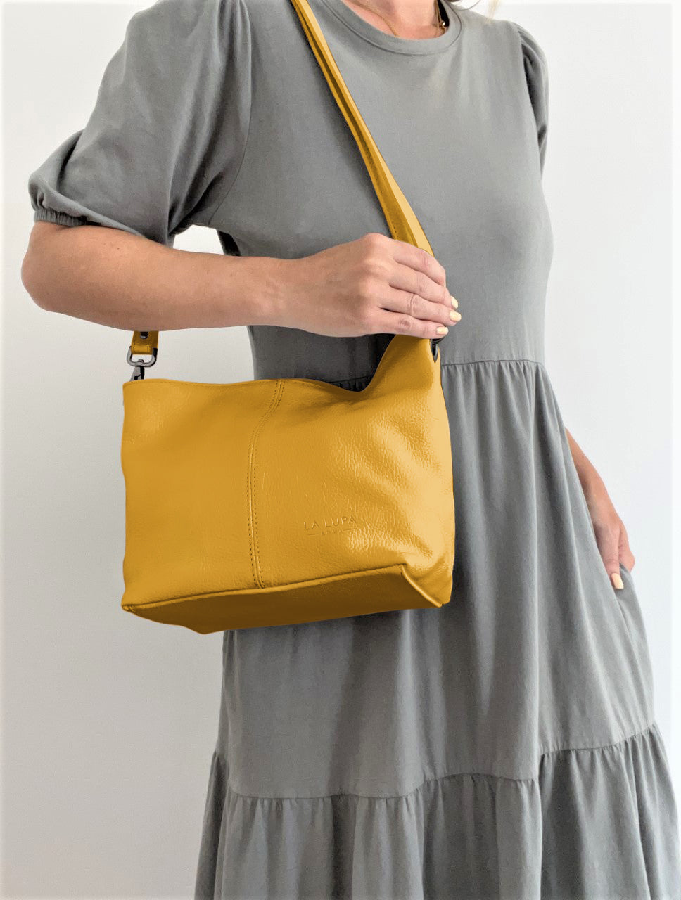 Lola Petite Mustard Crossbody Italian Leather Handbag from LA LUPA / Worn on shoulder