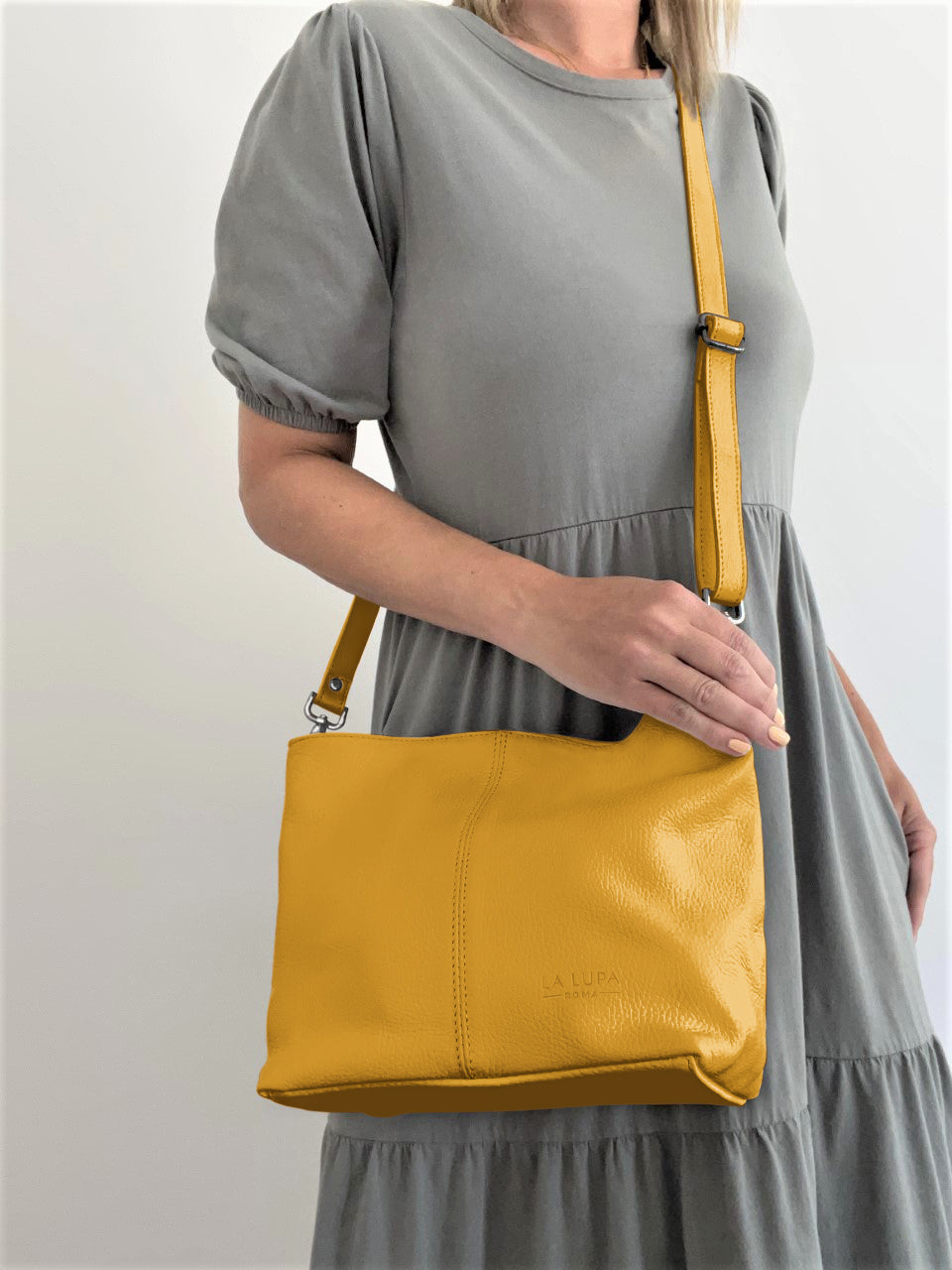 Lola Petite Mustard Crossbody Italian Leather Handbag from LA LUPA / Worn across body