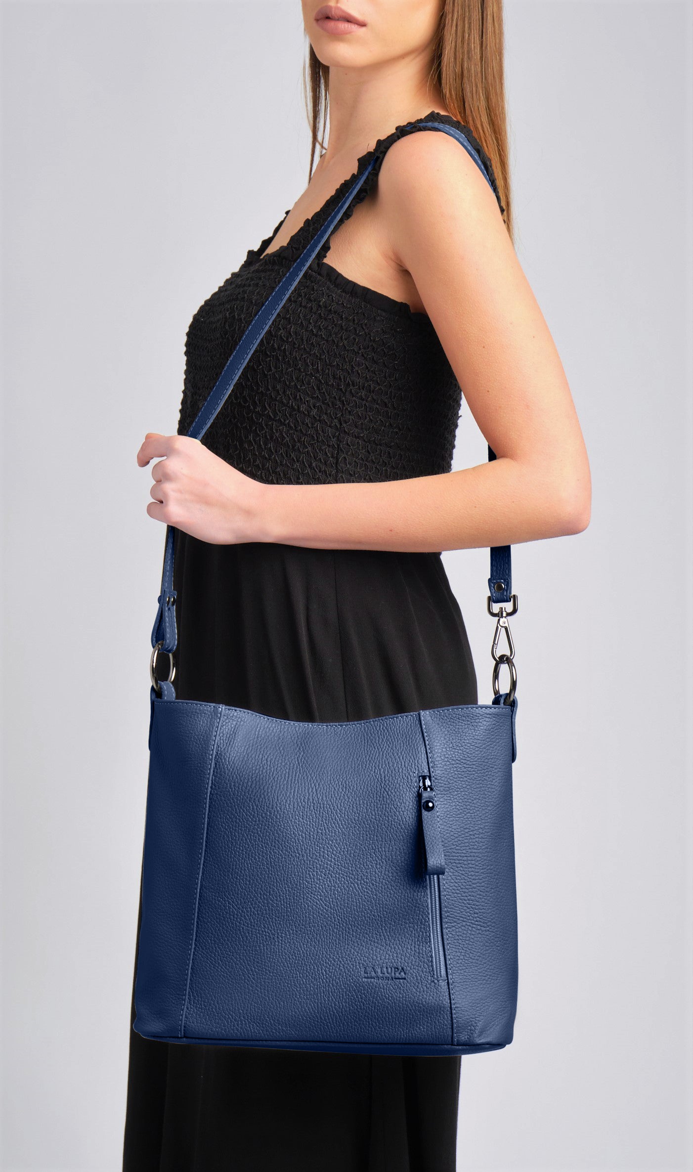 Valentina Crossbody Navy Italian Leather Handbag from LA LUPA / Model wears bag on shoulder