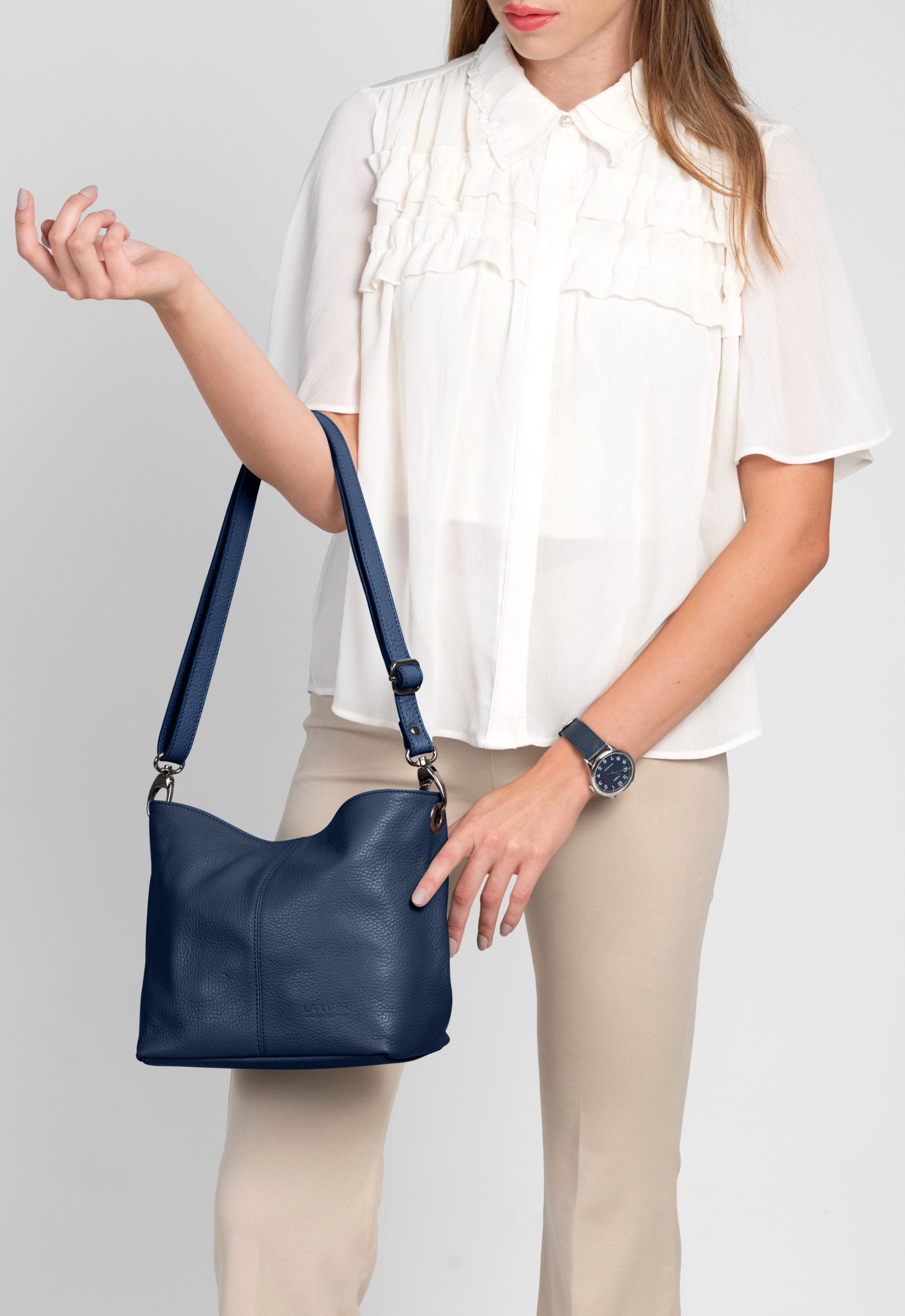 Lola Petite Navy Crossbody Italian Leather Handbag from LA LUPA / worn on arm