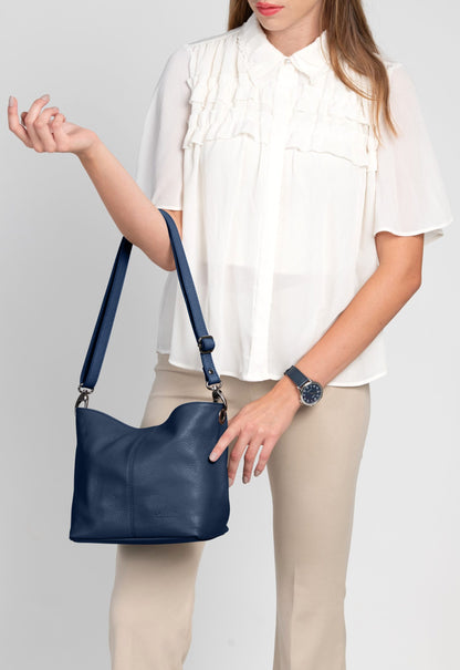 Lola Petite Navy Crossbody Italian Leather Handbag from LA LUPA / worn on arm