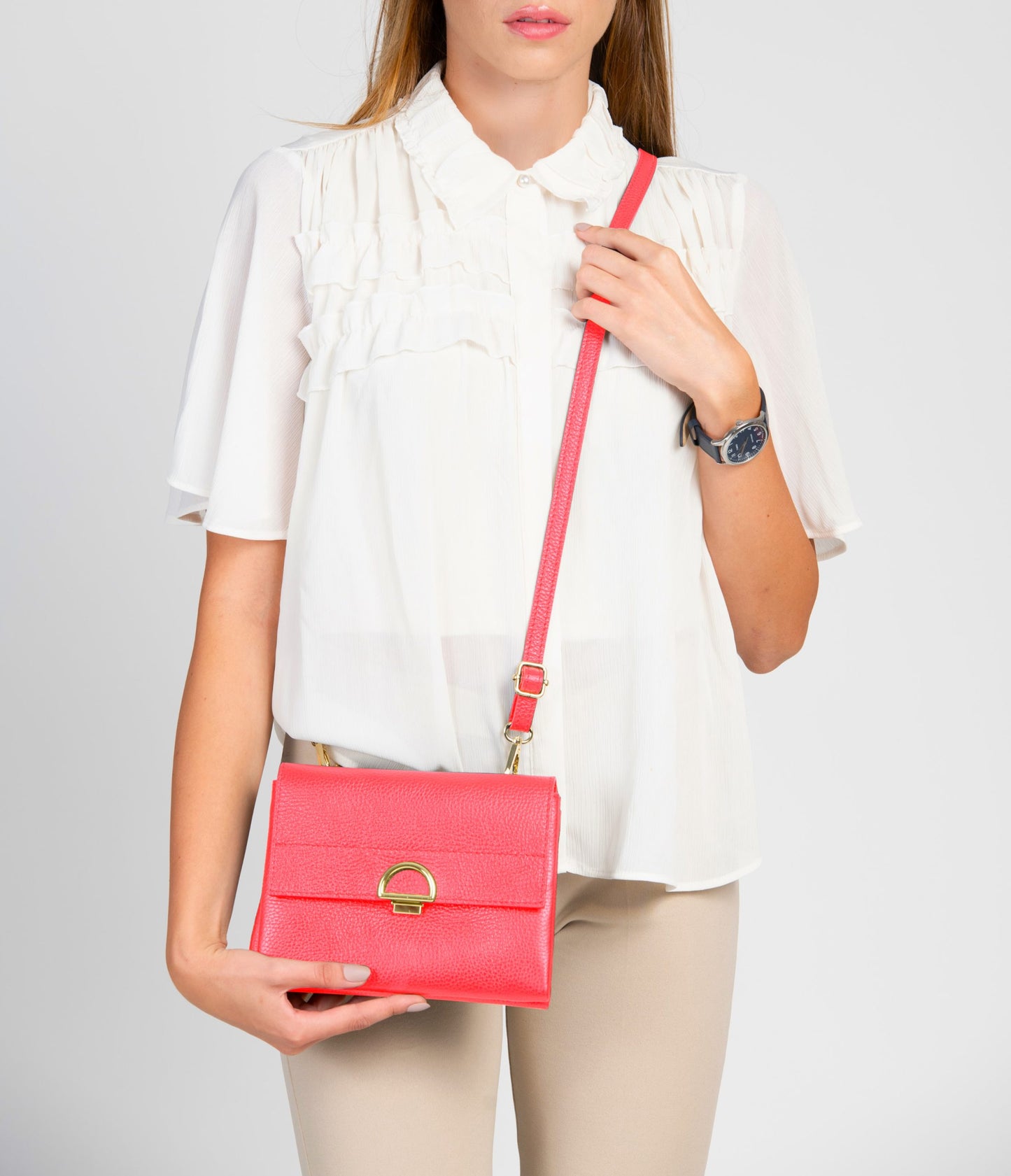 Sabrina Salmon Pink Crossbody Italian Leather Handbag from LA LUPA / Model wears bag across body