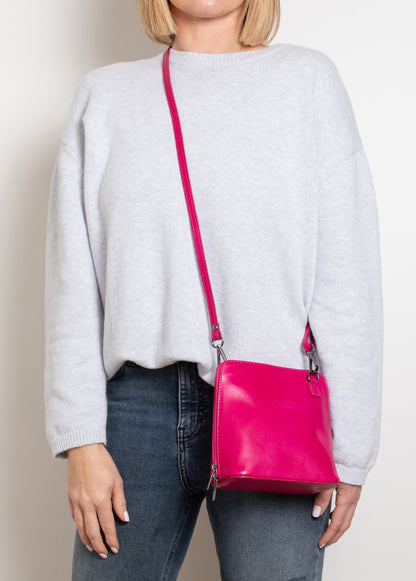 Rachele Mini Crossbody Fuschia Italian Leather Handbag from LA LUPA / Model wears bag across body