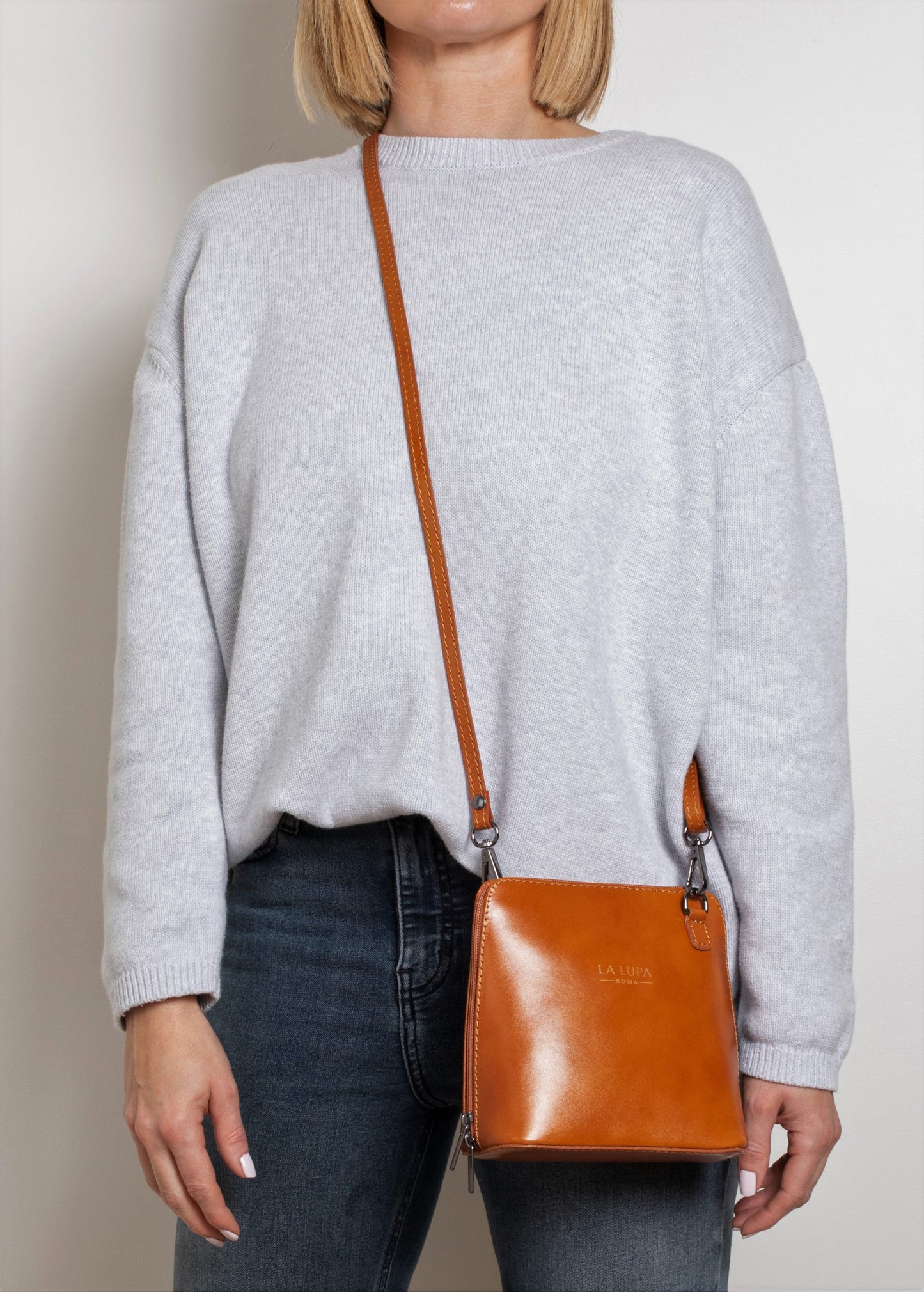 Rachele Mini Crossbody Tan Italian Leather Handbag from LA LUPA / Model wears bag across body