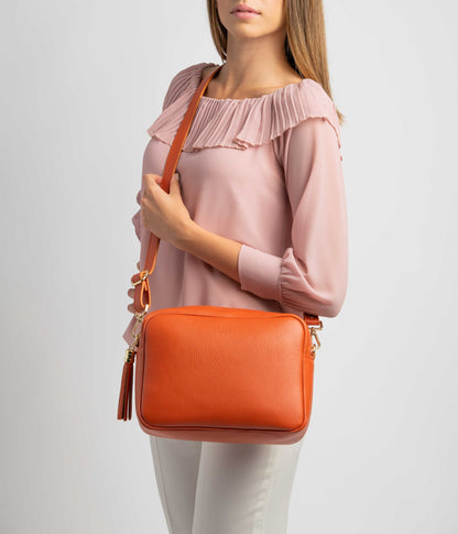 Allegra Orange Crossbody Italian Leather Handbag by LA LUPA / Worn over model across body