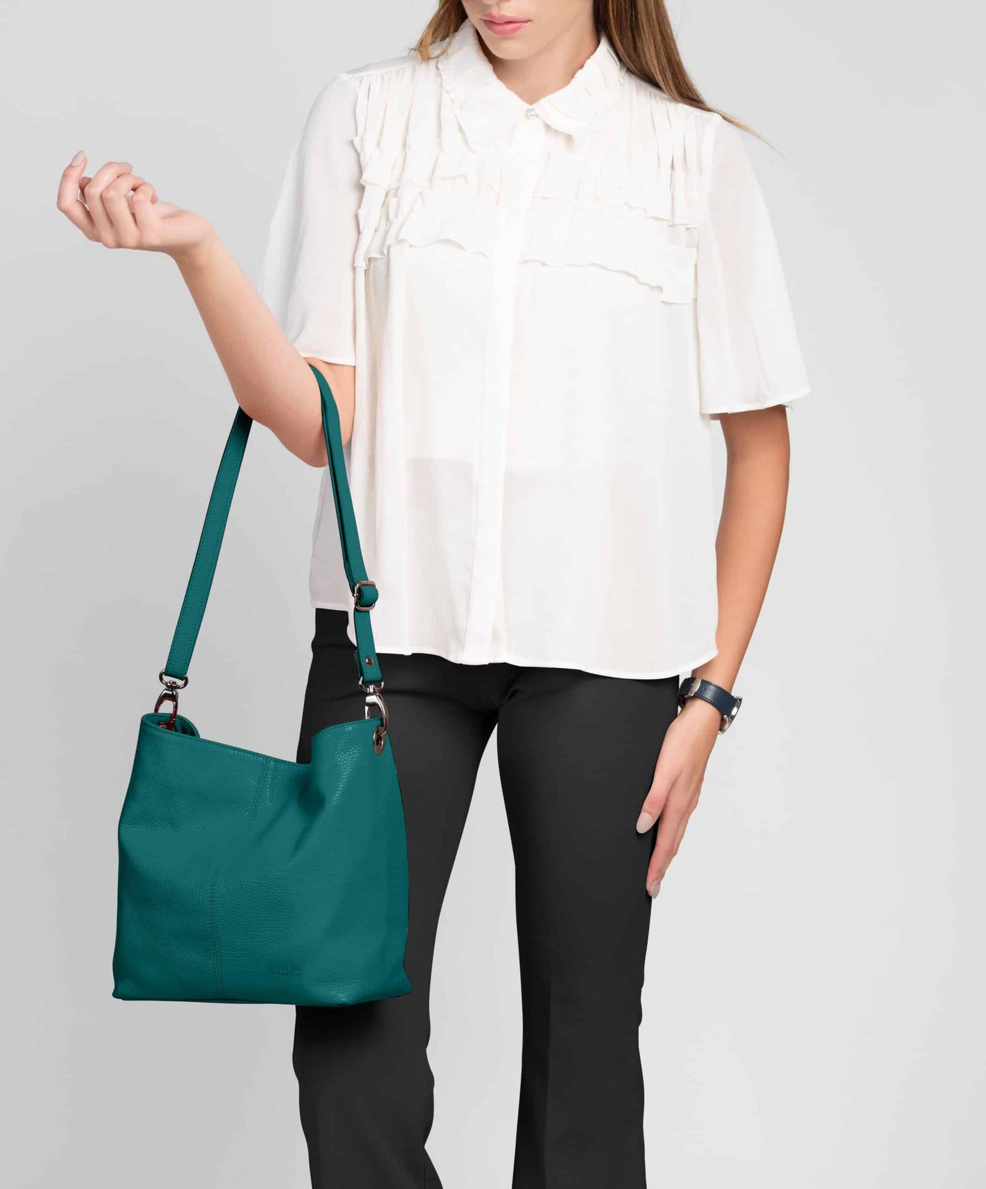 Lola Teal Crossbody Italian Leather Handbag from LA LUPA / Model wears bag on arm